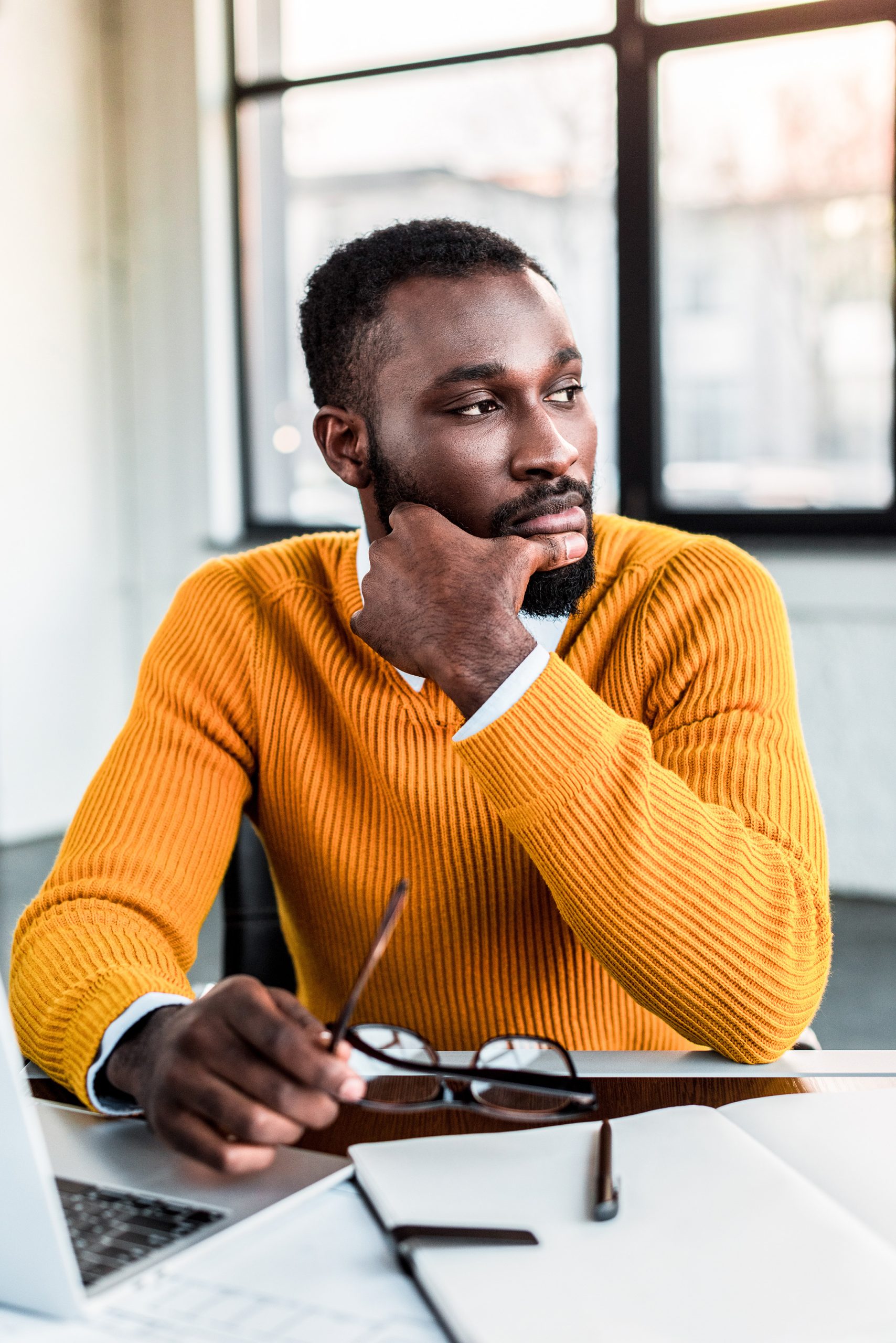pensive-african-american-businessman-looking-away-2024-11-18-04-19-05-utc