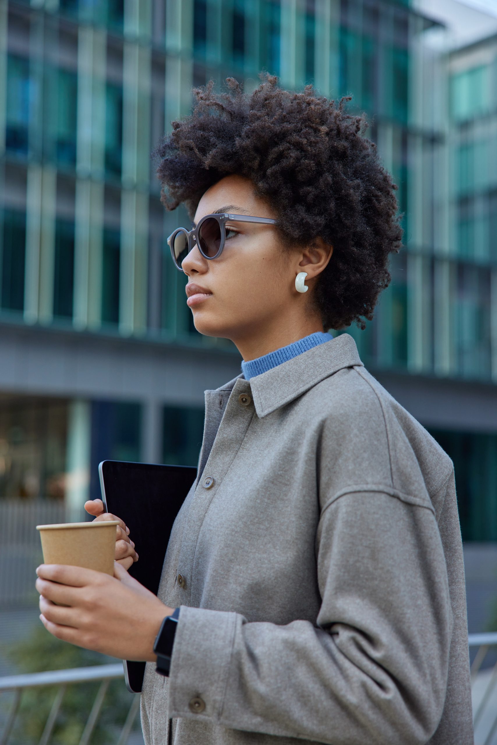 sideways-shot-of-fashionable-young-woman-with-curl-2025-10-14-08-56-53-utc